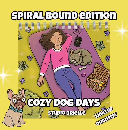 Illustrated cover of a spiral-bound book titled 'Cozy Dog Days' with a person and dog on a yellow background.